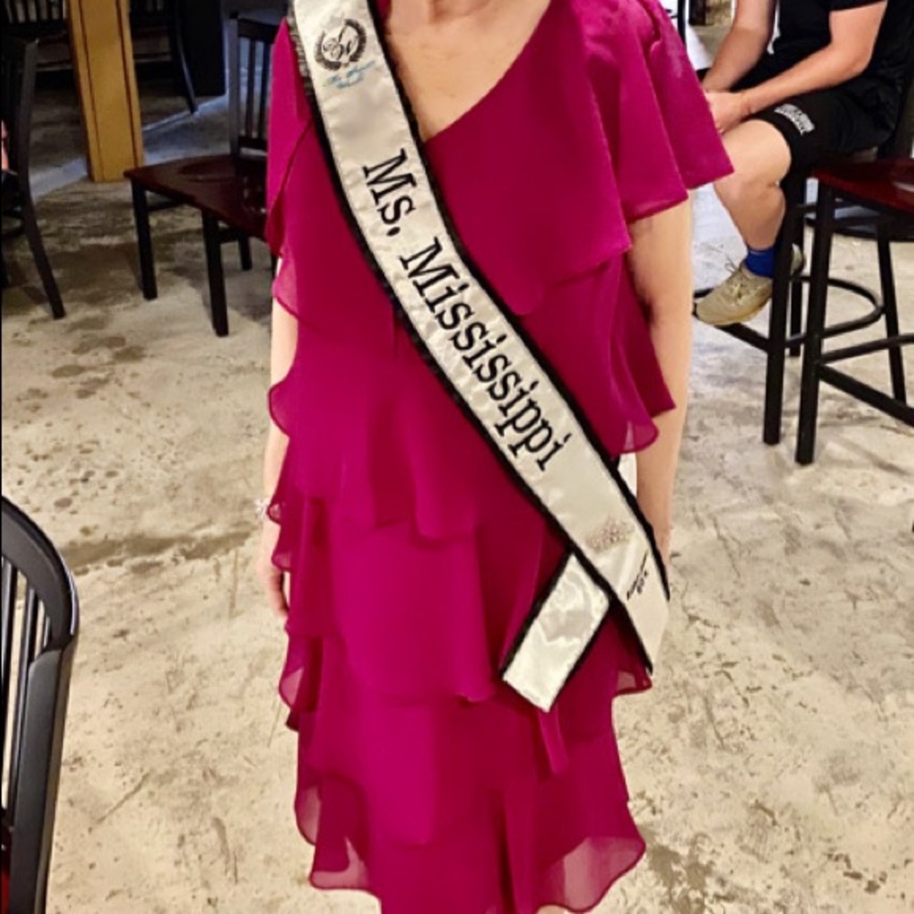 Purple cocktail dress.